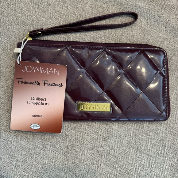 NWT - Joy and Iman Quilted Collection Wristlet
Burgundy - Picture 1 of 9